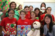 4-H Hilo Rainmakers club wraps presents for Catholic Charities